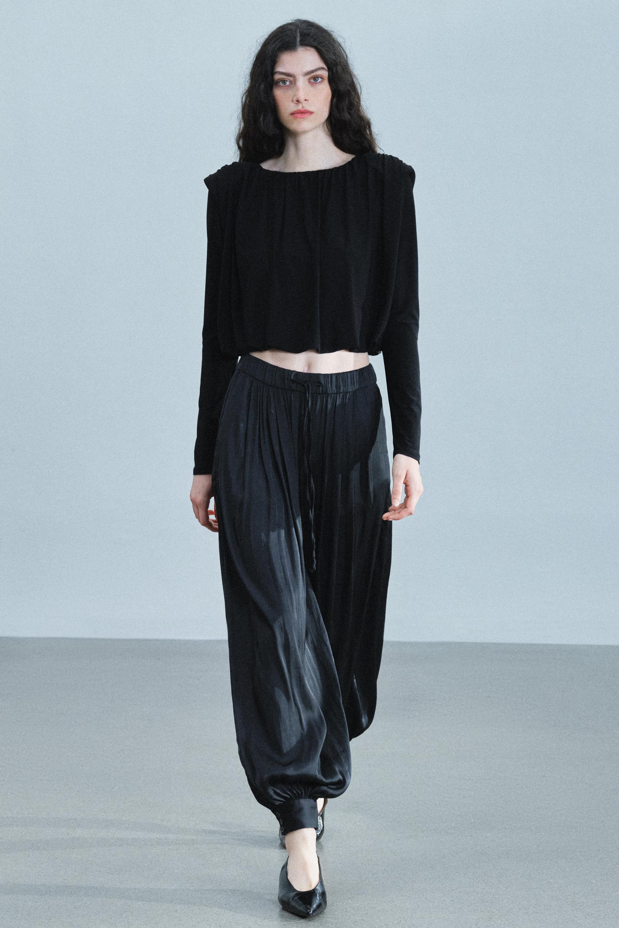 DRAPED SHOULDER-PAD TOP